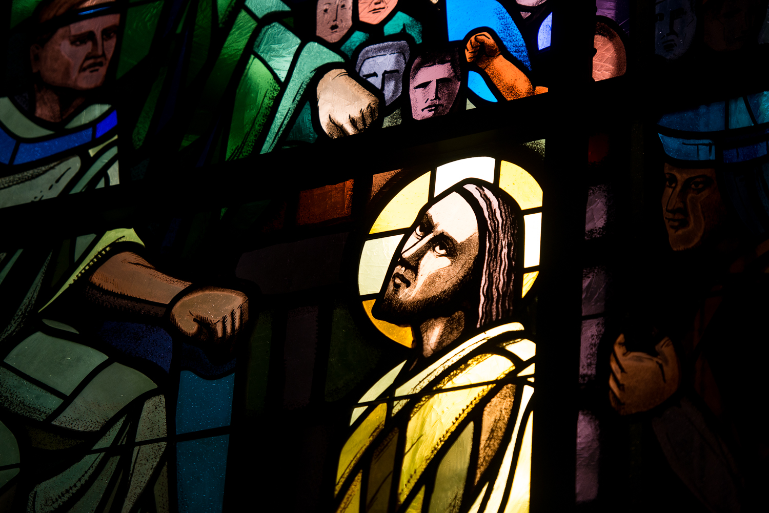 Stained glass window in the Chapel of the Holy Spirit at Assumption College depicting Jesus Christ