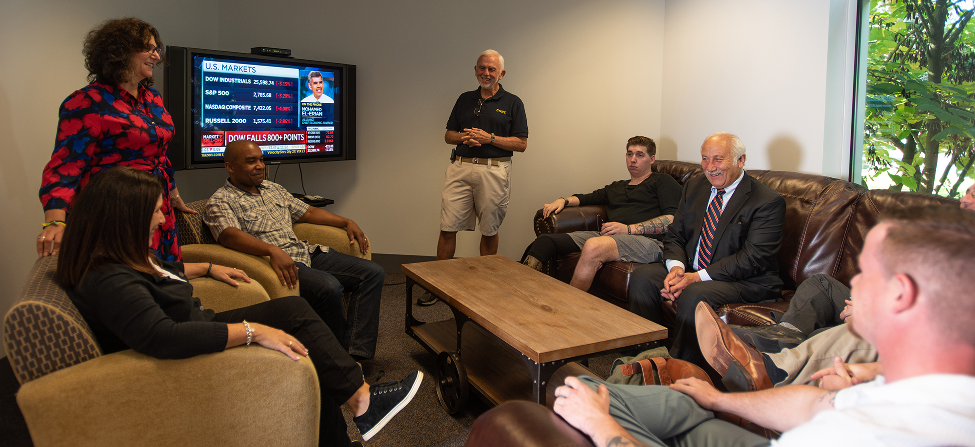 Assumption College faculty, administrators and students in the new Veterans' Lounge.
