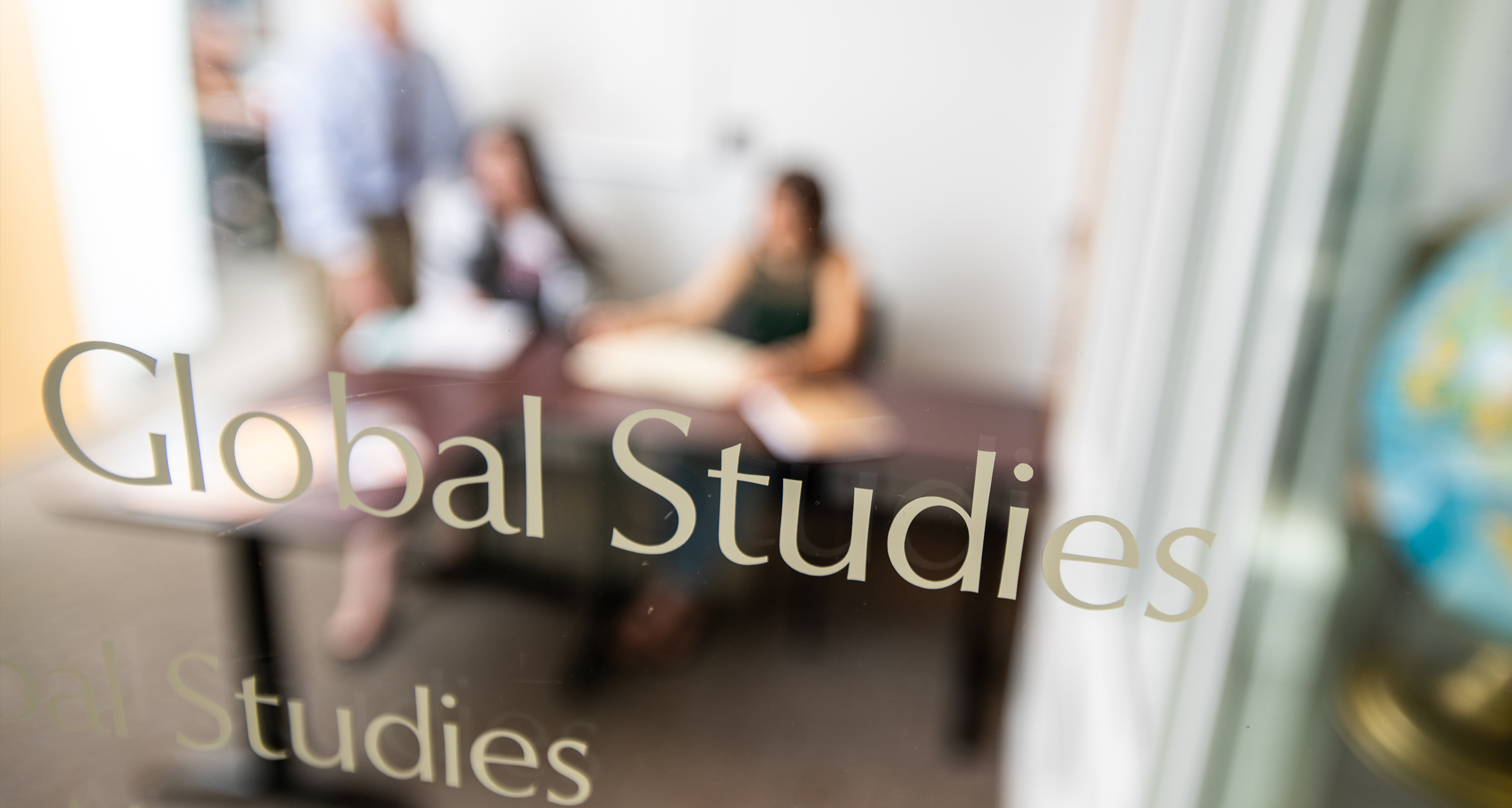 Photo of the exterior door to the Center for Global Studies at Assumption College.