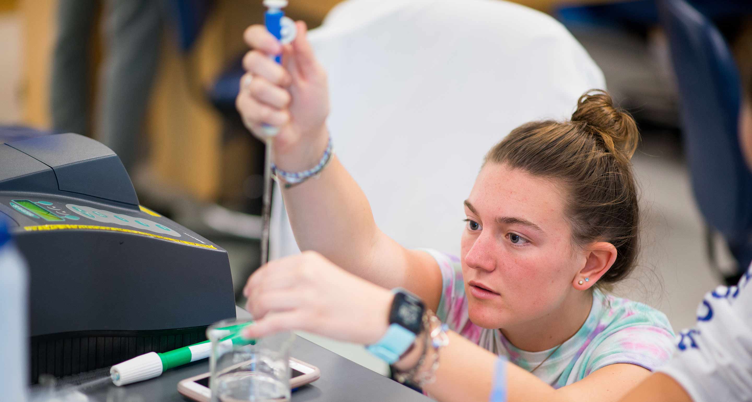 student working in lab