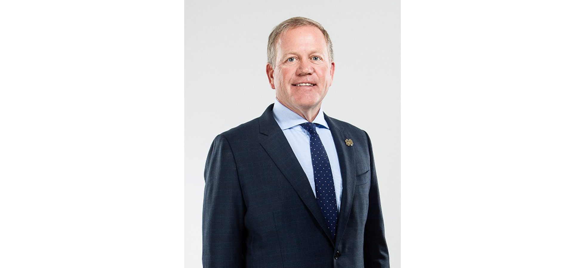 Headshot of Assumption University graduate and University of Notre Dame’s Dick Corbett Head Football Coach Brian Kelly