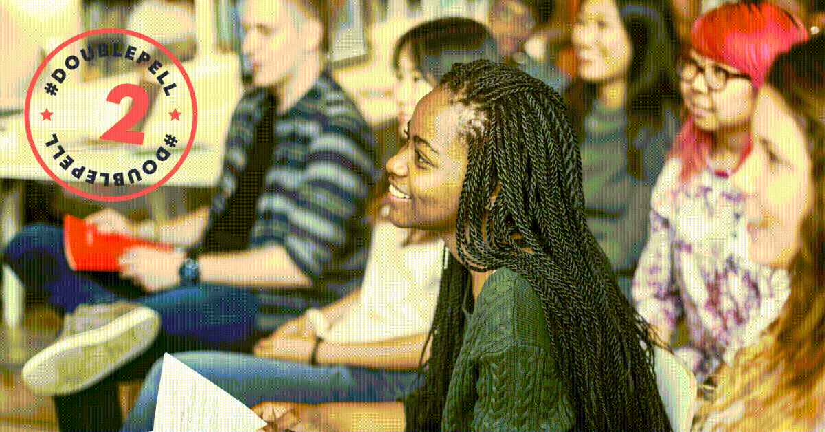 Photo of a college student in a classroom promoting an effort to double federal Pell Grants
