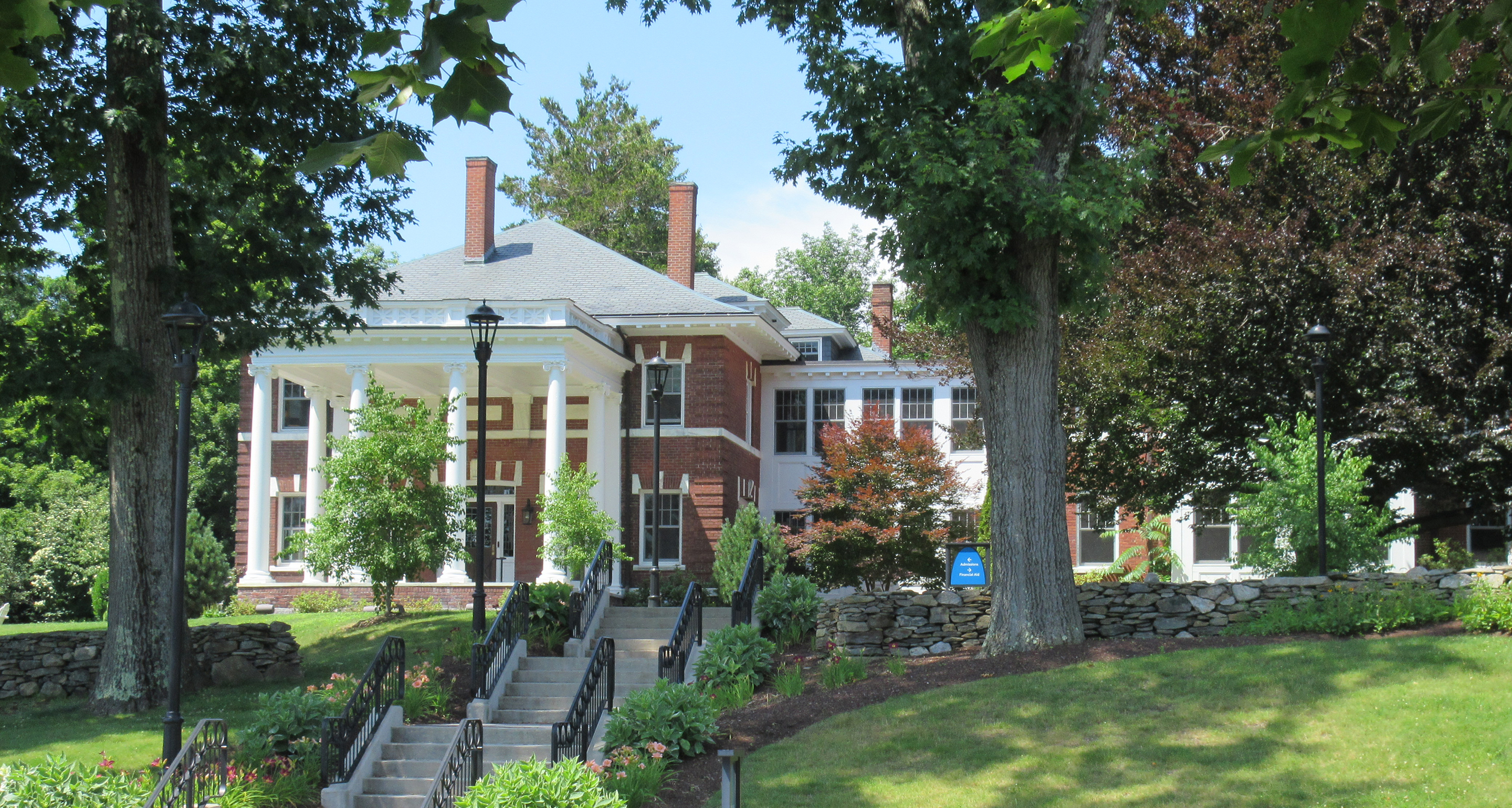 The brick Admissions House located on the Assumption University campus.