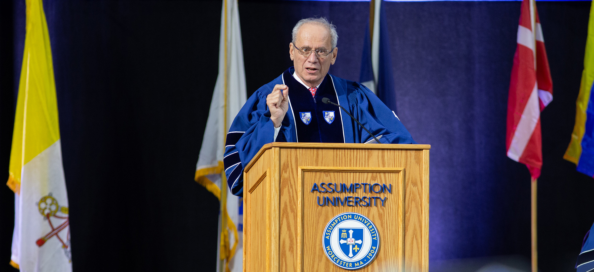 President of the Worcester Red Sox Larry Lucchino speaking at the Assumption University Commencement.