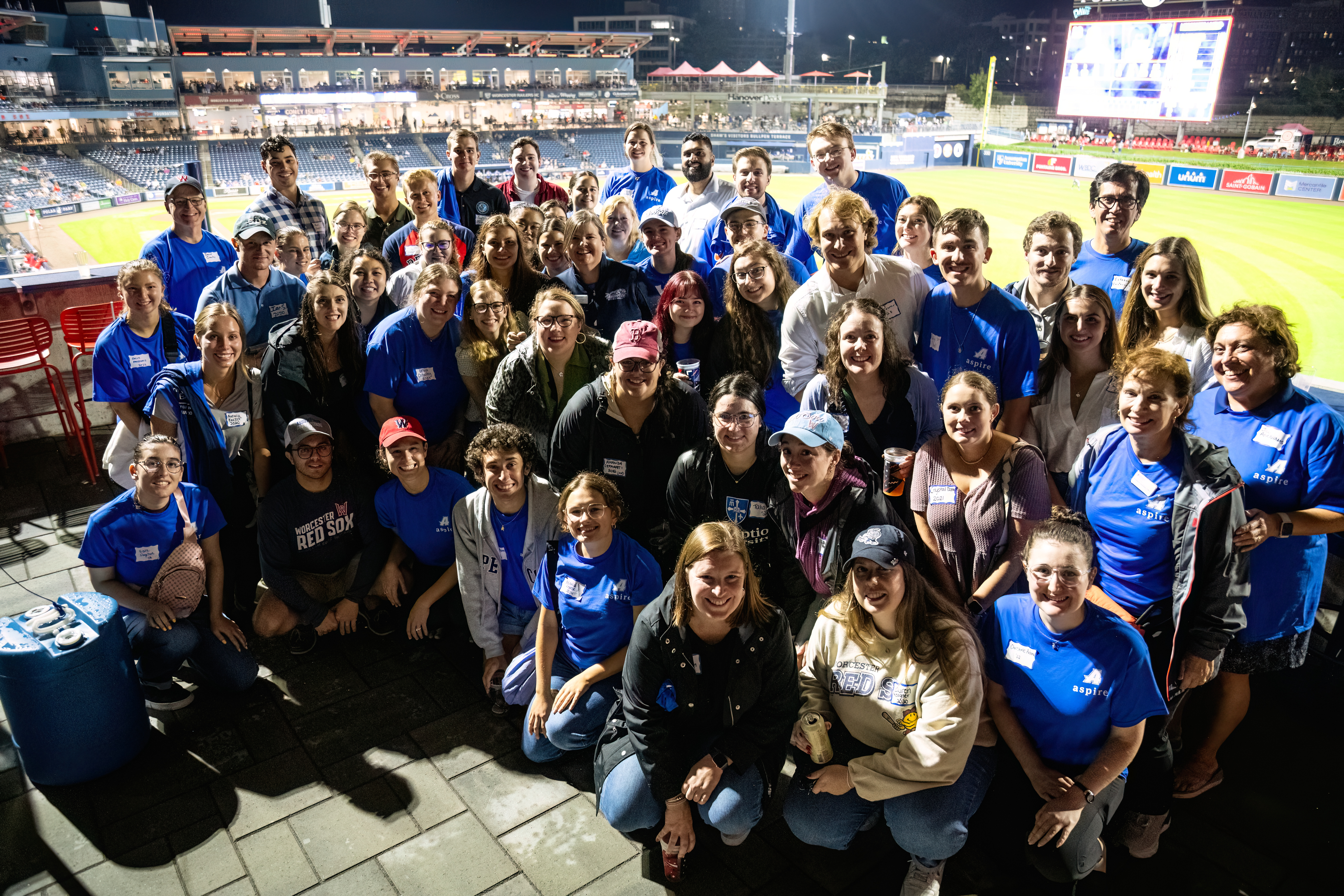 Assumption University's ASPIRE program faculty, students, and alumni attend a Worcester Red Sox game.