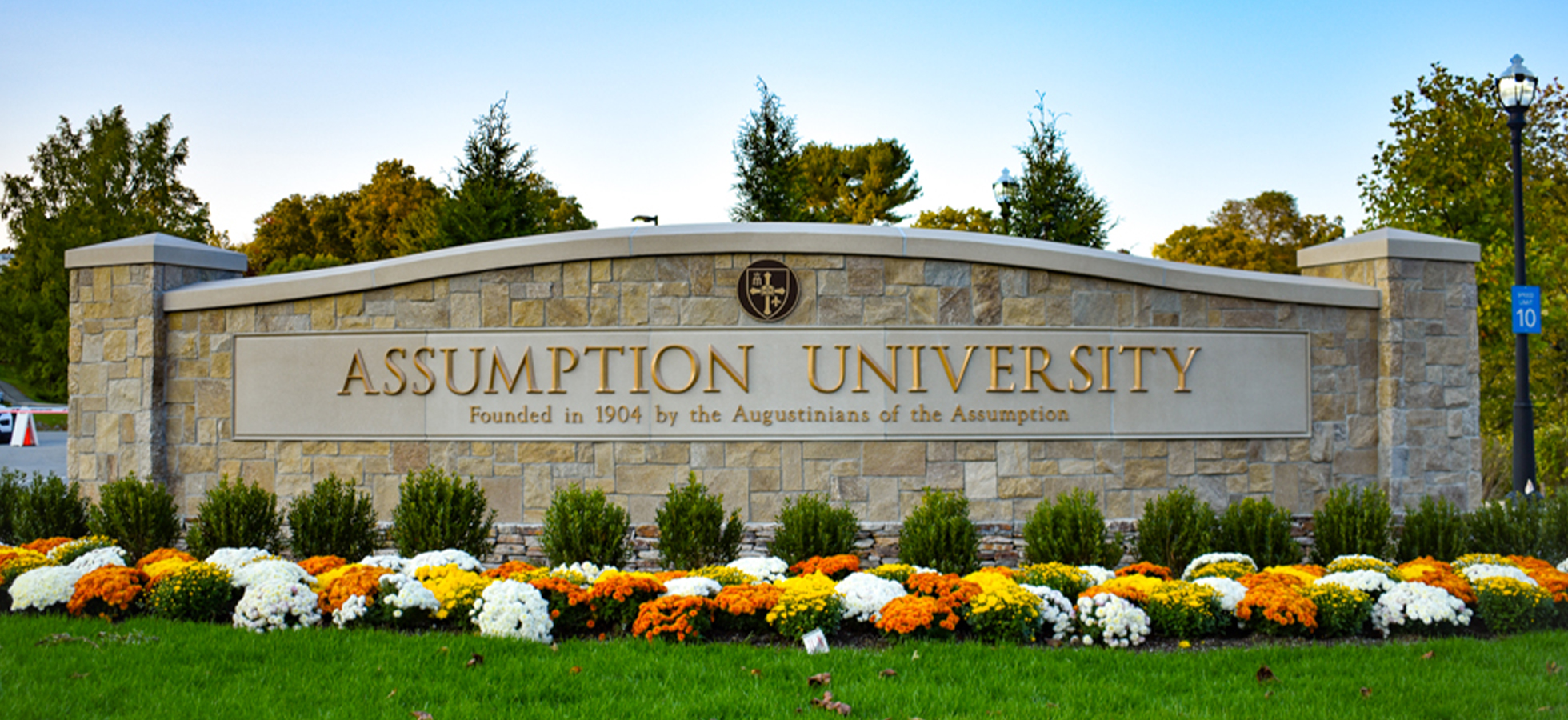 Assumption University sign at the front of campus, where a new alternative to the FAFSA was just launched