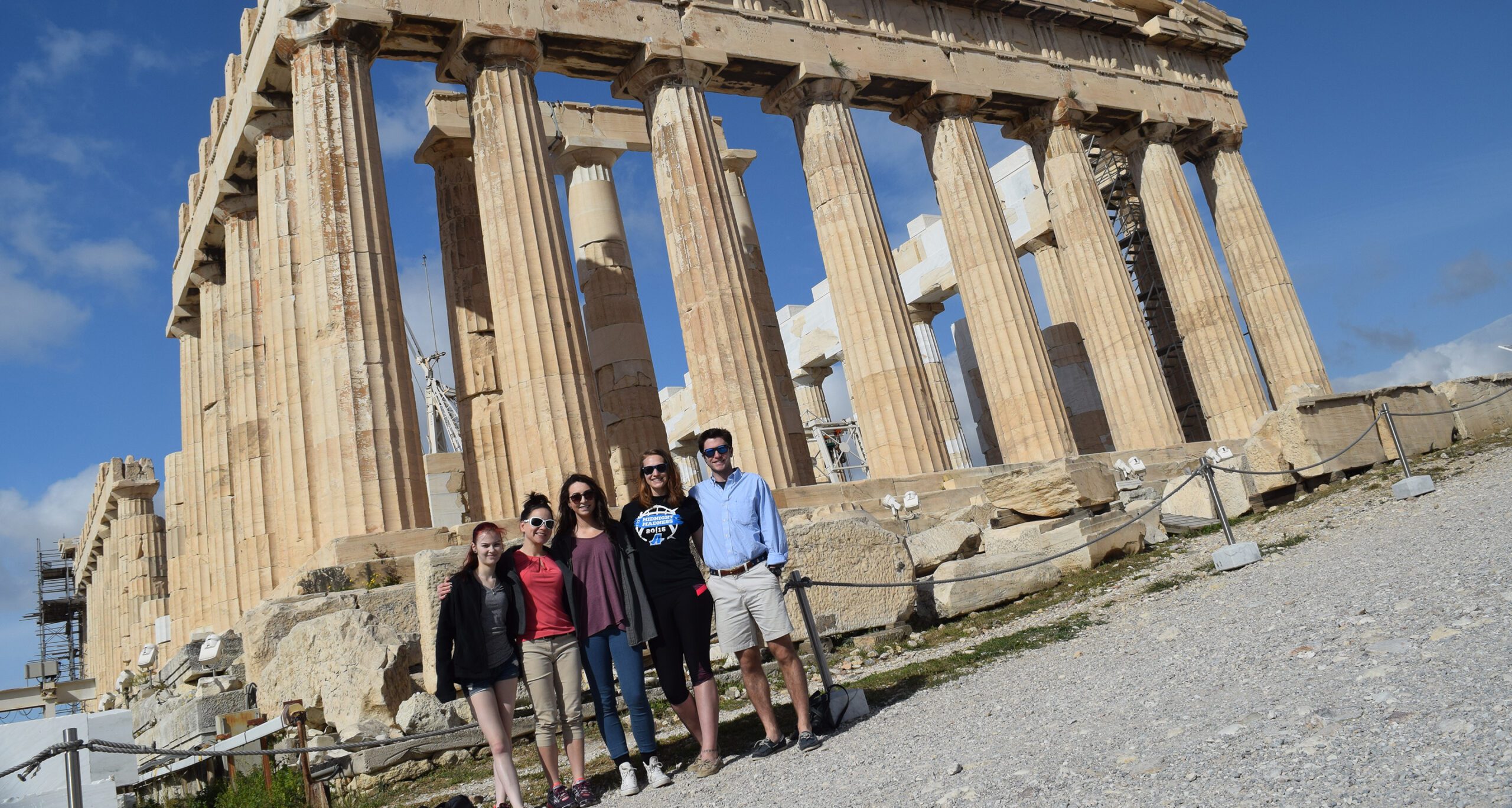 Assumption College students exploring the Parthenon in Greece.