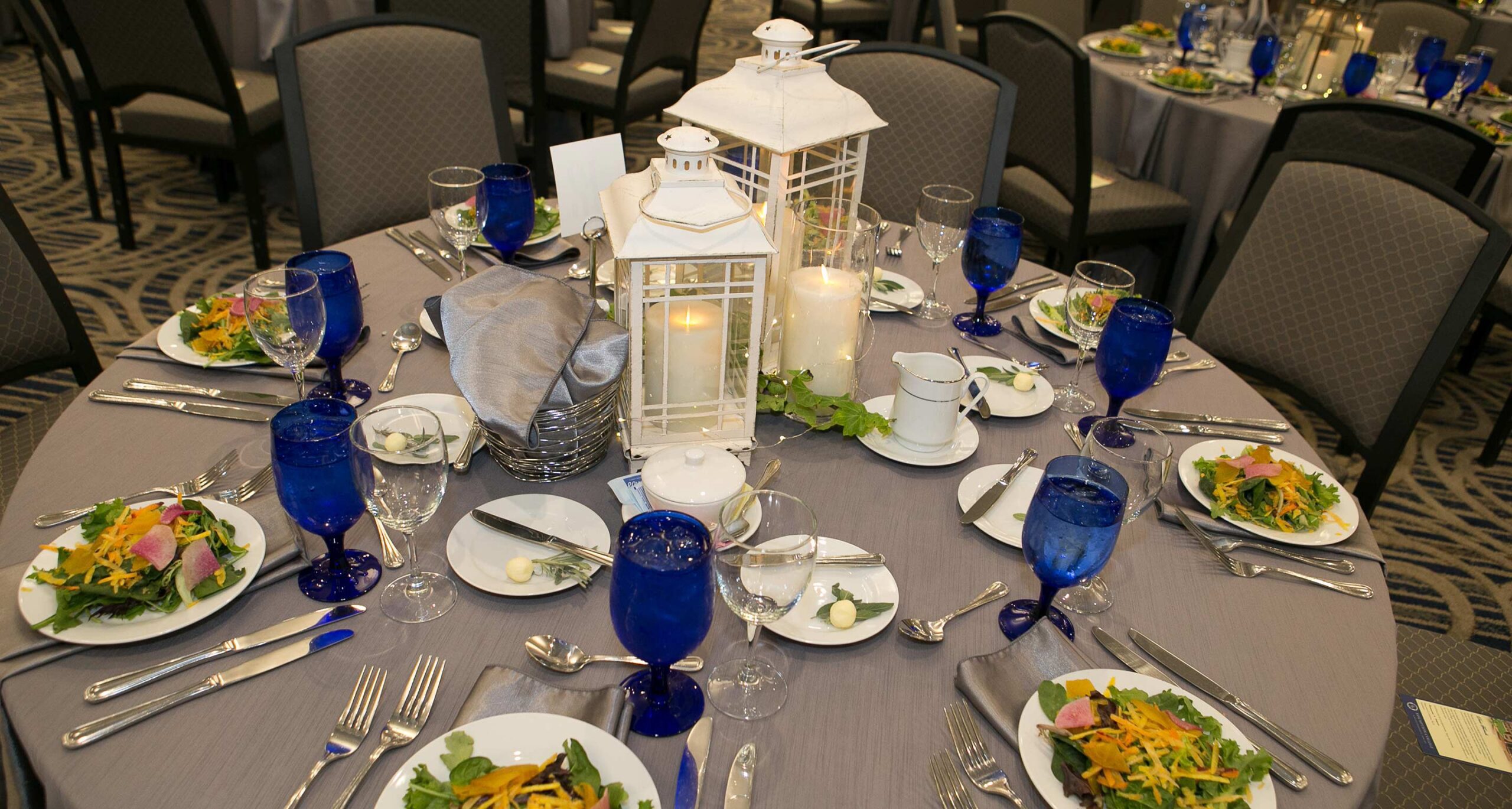 A table set for dinner in the 350-seat ballroom of the Tsotsis Family Academic Center on the campus of Assumption College.