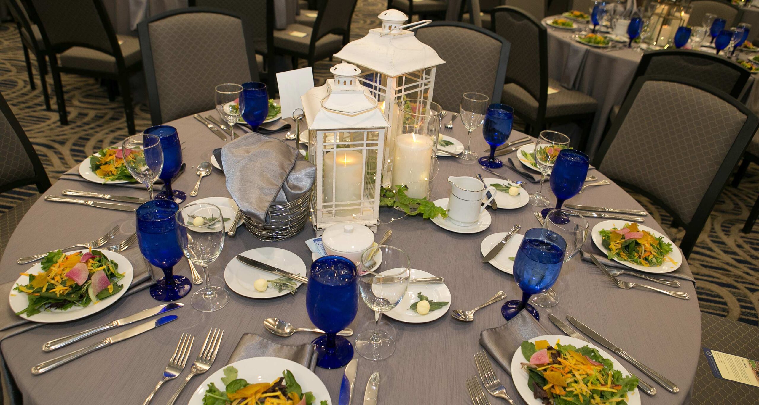 A table set for dinner in the 350-seat ballroom of the Tsotsis Family Academic Center on the campus of Assumption University.