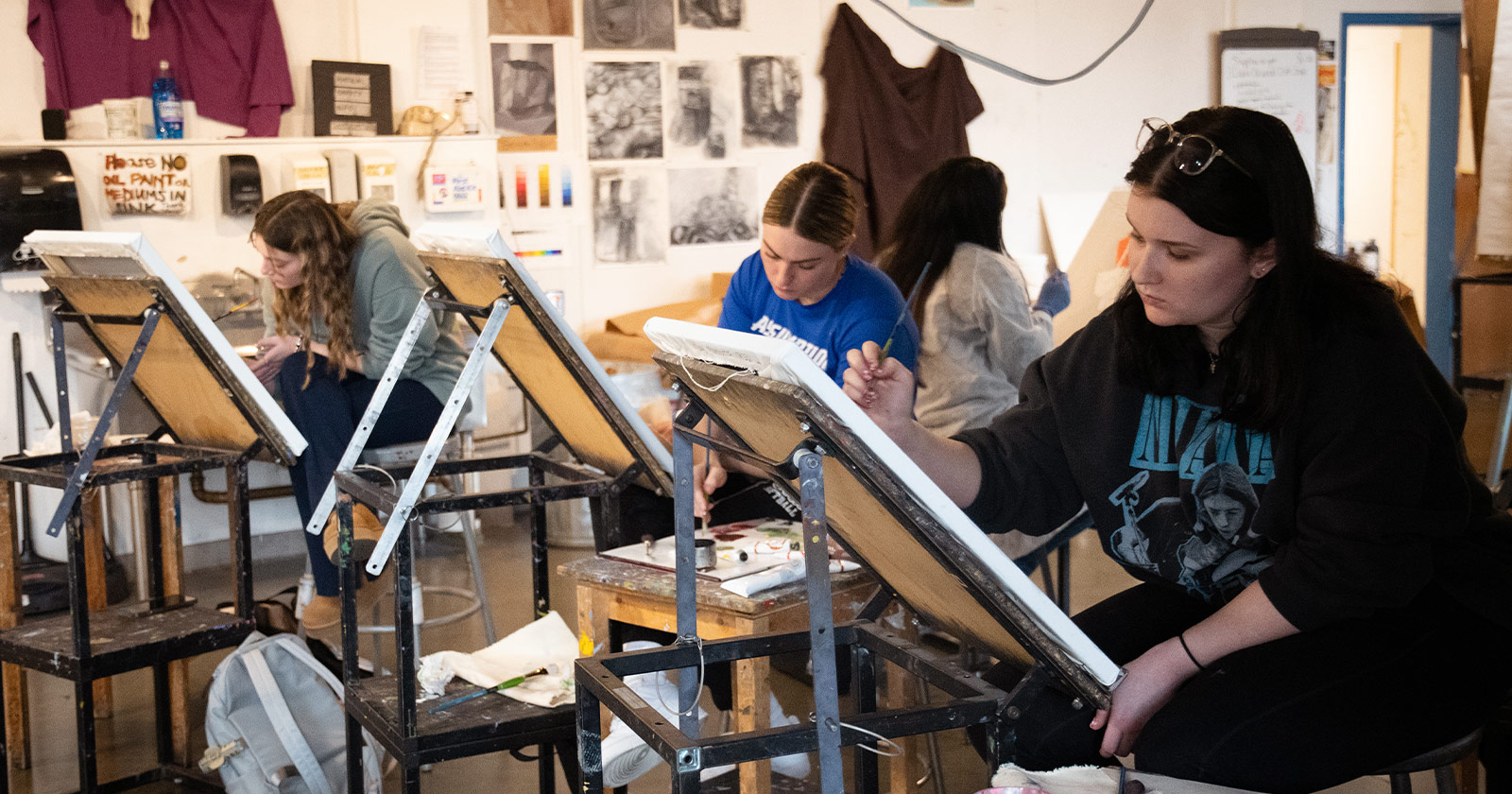 Students work on sketching during an art course at Assumption University's D'Amour College of Liberal Arts and Sciences.