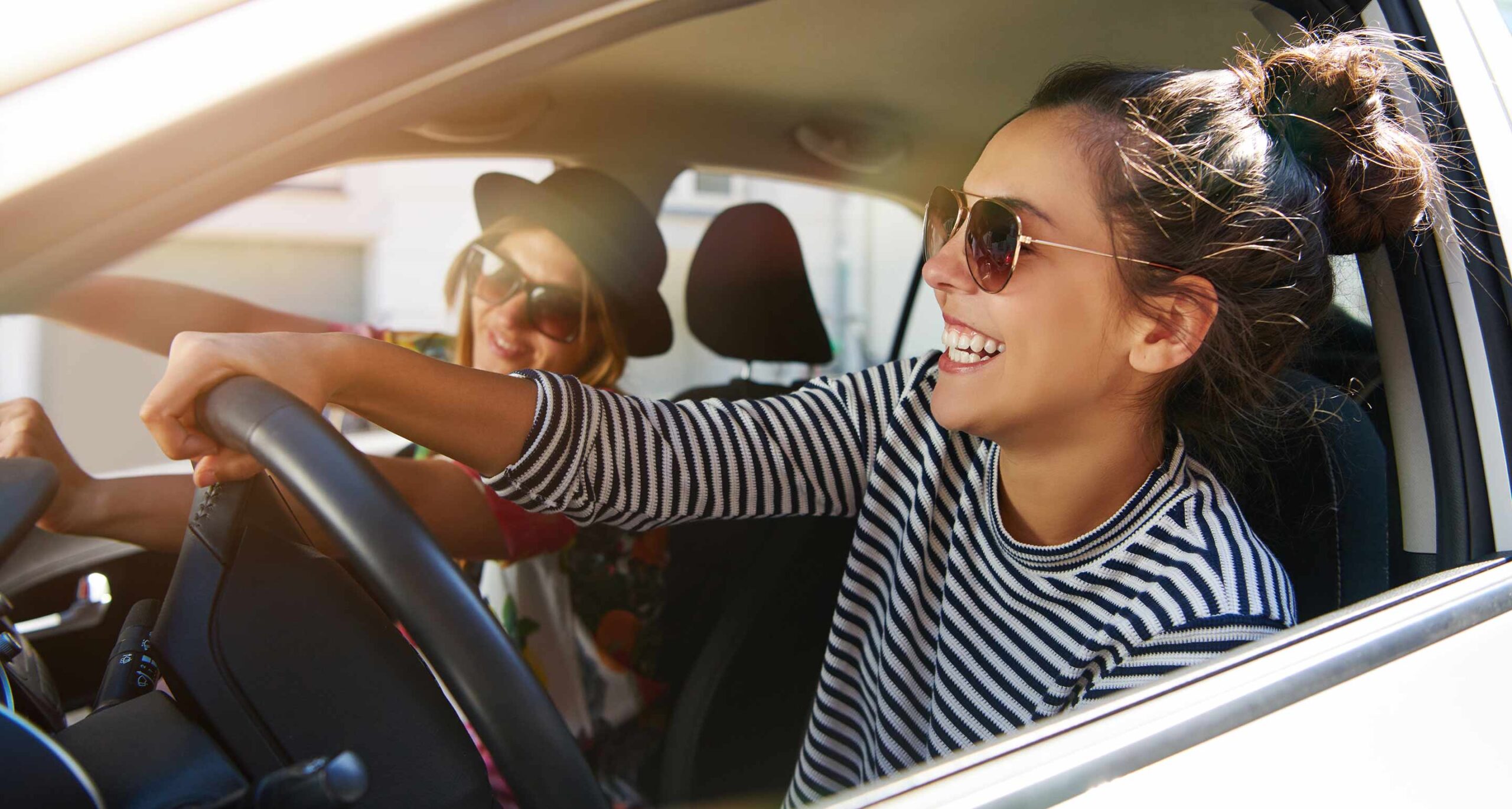 students in car