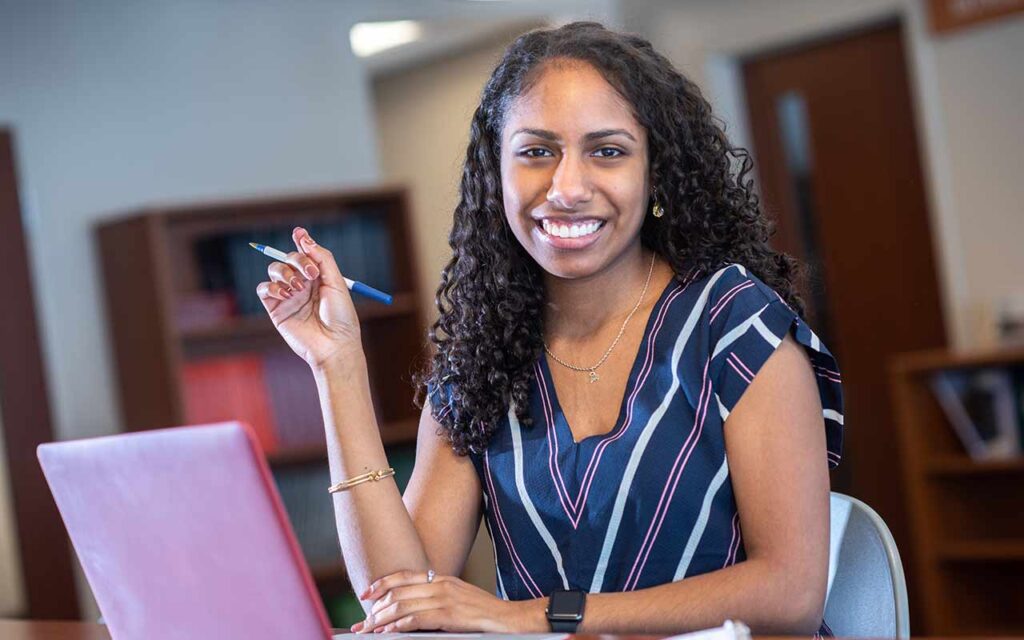 student working on laptop