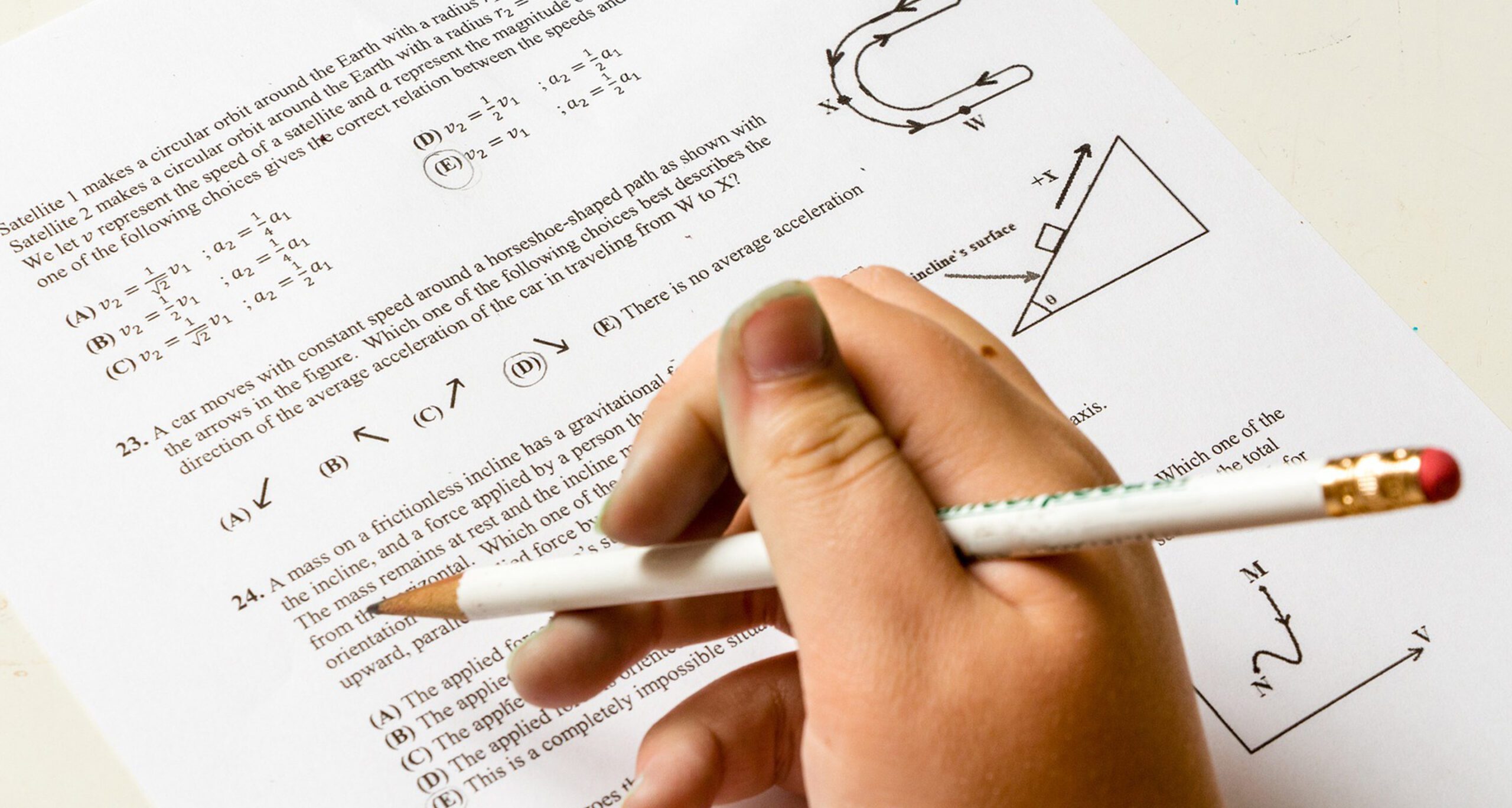 Image of a hand and math problems used to promote a math academy at Assumption University