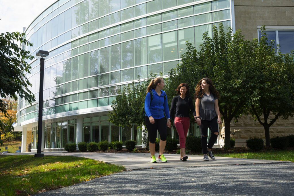 The female students walking by the Testa Science Center