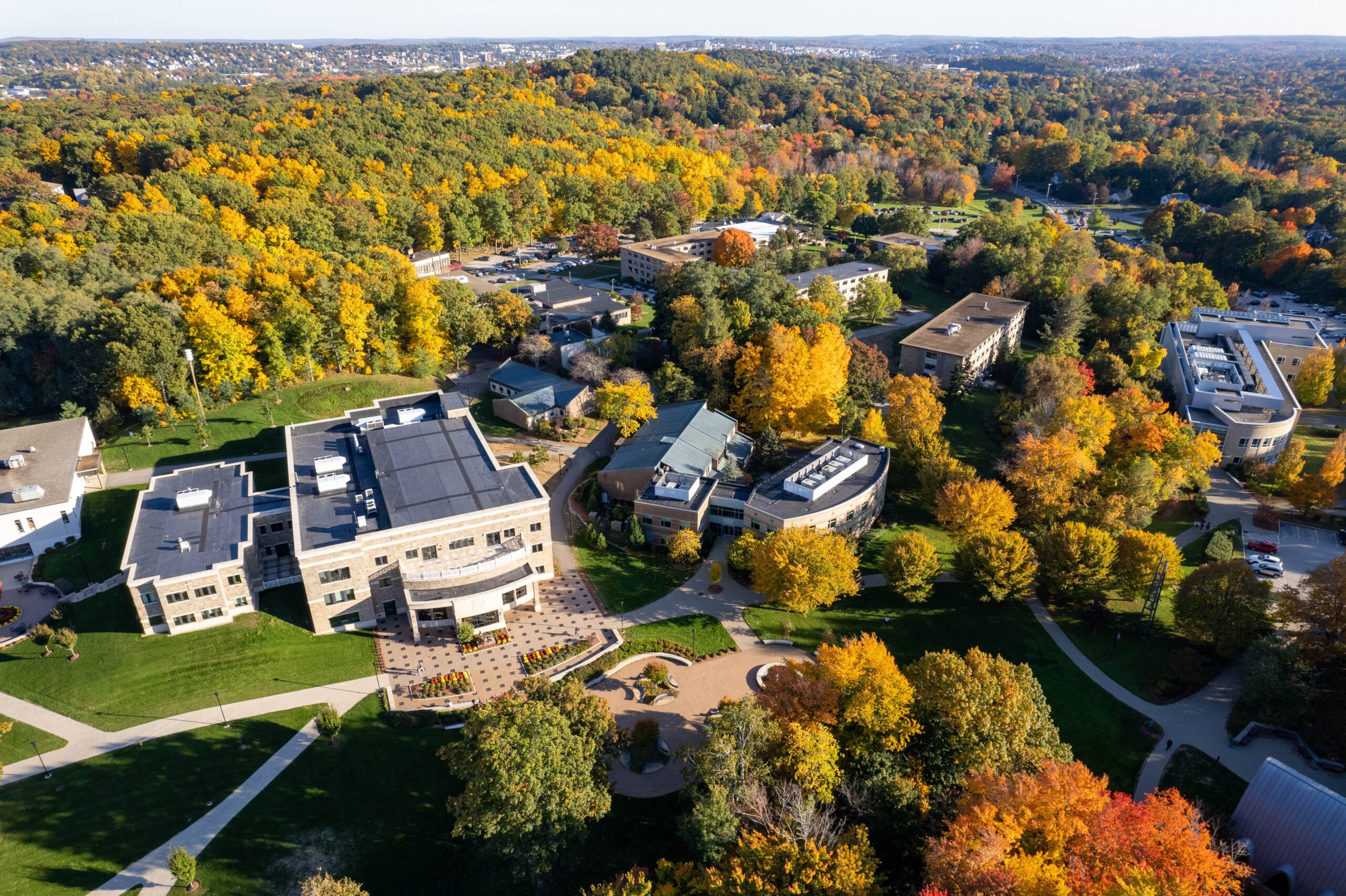 An aerial shot of the center of Assumption University's beautiful campus in the fall