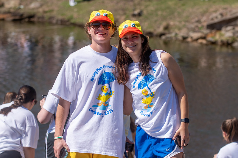 Assumption students wearing yellow "Duck Day" hats to celebrate the special event