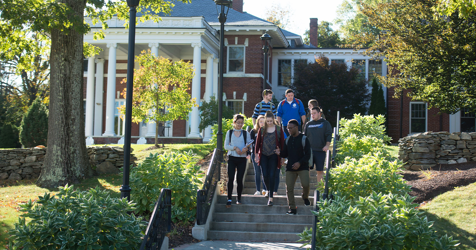 Students having fun, while walking around campus.