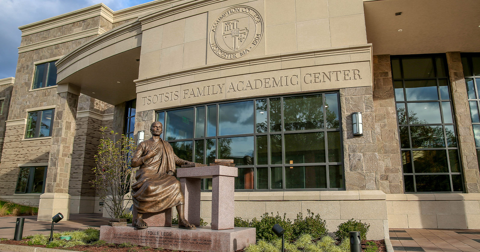 A photo of the statue of St. Augustine outside the Tsotsis Family Academic Center at Assumption University.