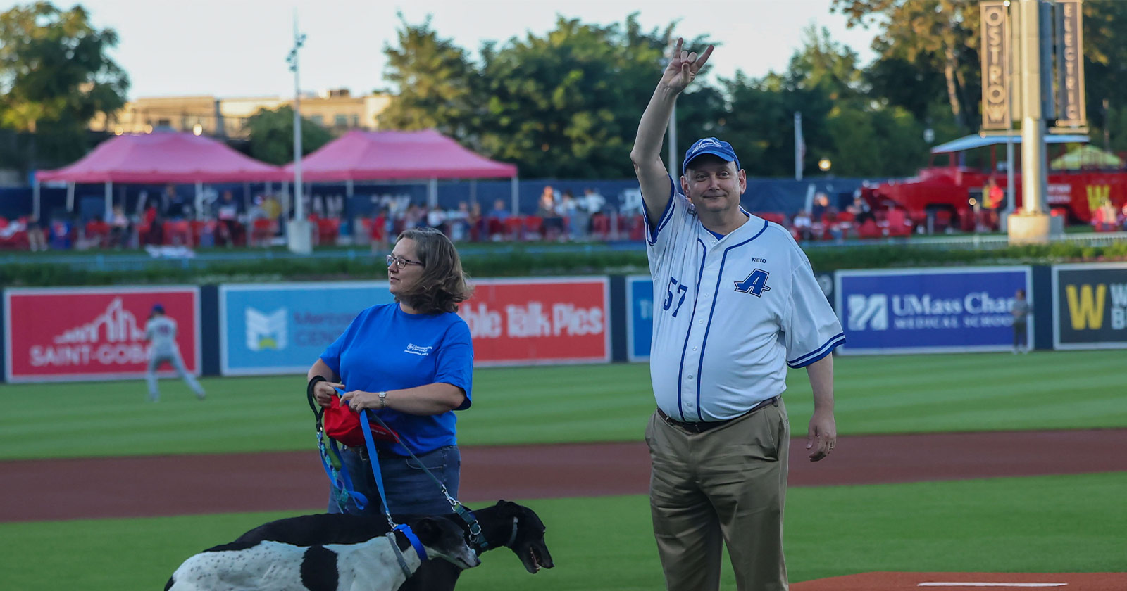 Assumption University President Greg Weiner attends a Worcester Red Sox game.