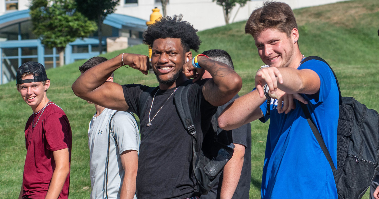 A group of Assumption University students pose for a photographer.