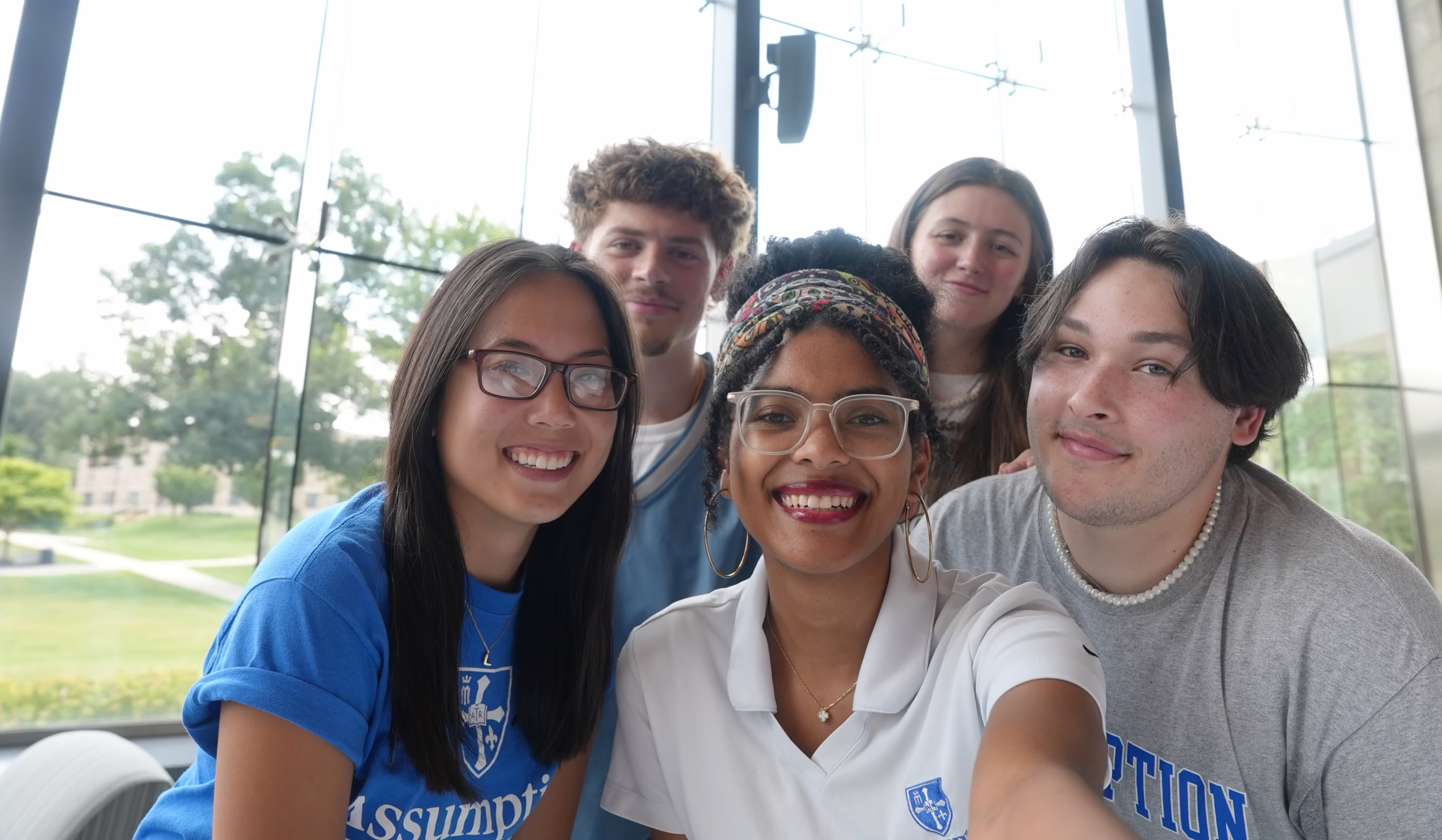 Group of Assumption students smiling together