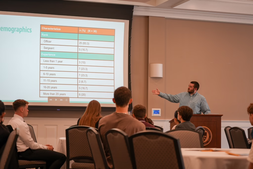 A student presents research at the 2025 Undergraduate Research Symposium