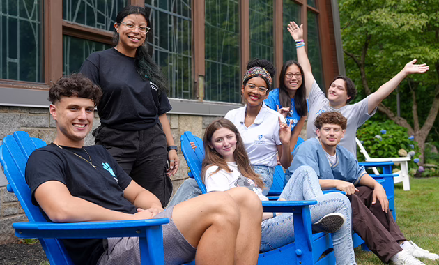 A group of Assumption University students in front of the Chapel of the Holy Spirit on Assumption's Worcester, MA campus