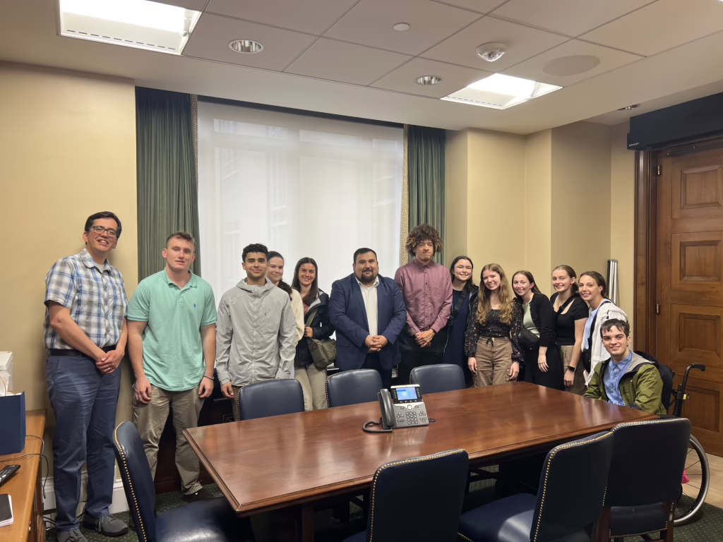 SOPHIA students and staff meet with alum Jose Garcia.